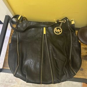 Michael Kors Black Crossbody Bag with Gold Accents